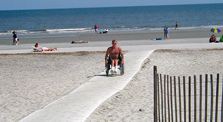 Beach Matting being used by a wheelchair user