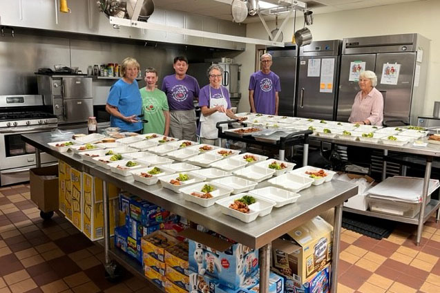 Volunteers in food kitchen