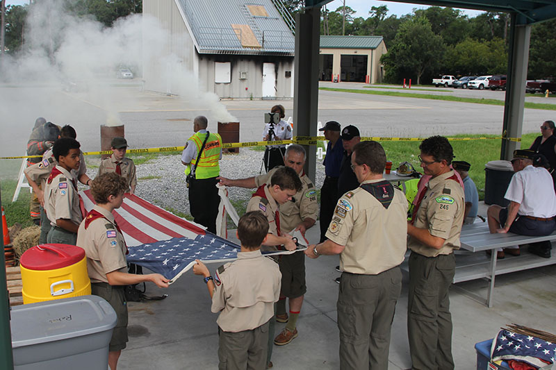 Boy Scouts perpare flags for disposal