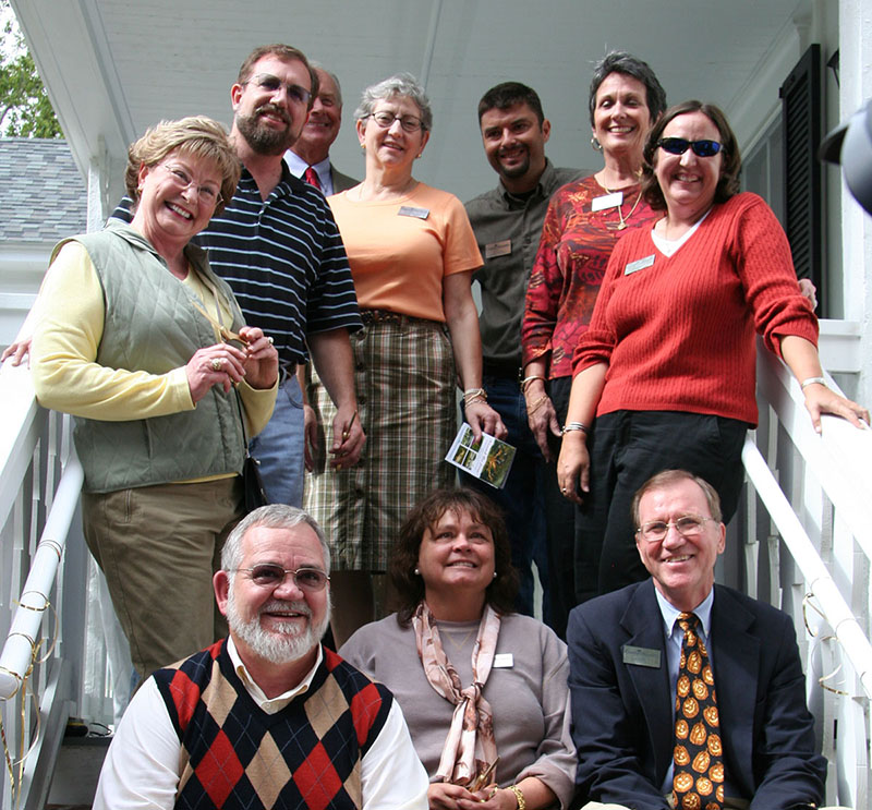Particpants posing for ribbon cutting