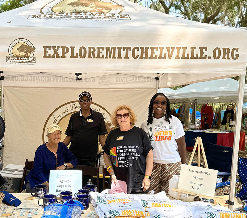 ExploreMictchelville.org tent and volunteers