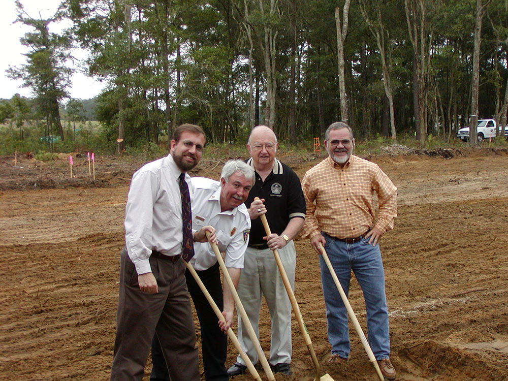 Mayor Peeples, Bill Mottel, Tom Fieldstead, Steve Riley with shovels
