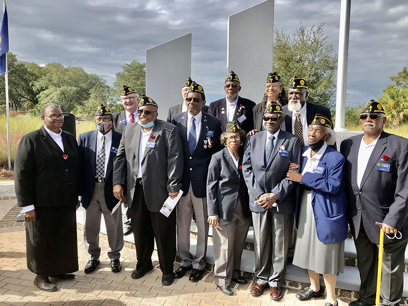 Veterans in front of Memorial